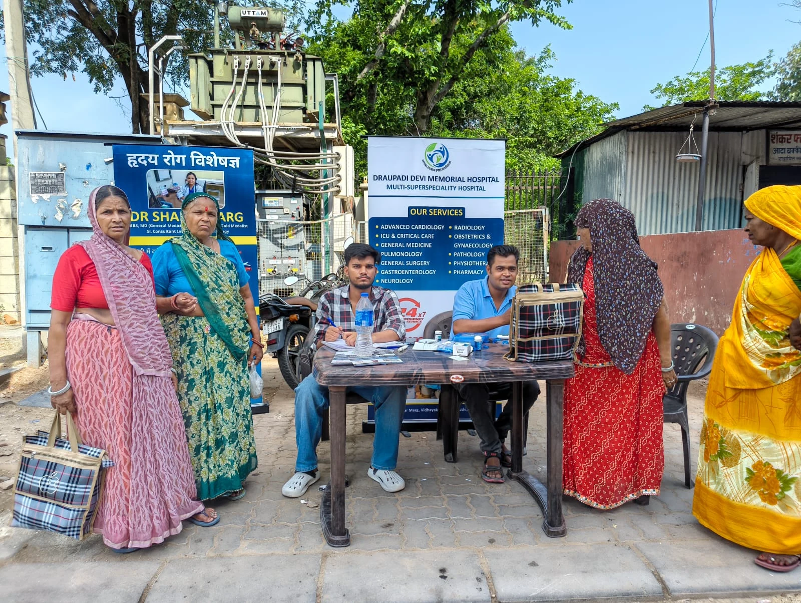Community health camp by Draupadi Devi Memorial Hospital